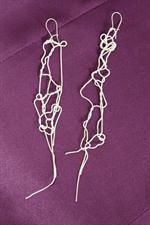 voir cet article : Julie Schouvey Boucles d'oreilles 