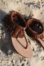 voir cet article : Tatoosh Nu pied en cuir frangé chocolat