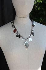 voir cet article : Reminiscence Bijoux Collier J'aime ma planète