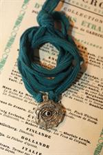 voir cet article : Catherine Michiels Cosmic Eye bronze