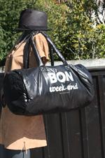 voir cet article : Caroline Lisfranc Sac polochon doudoune week end