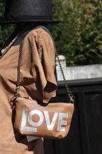 voir cet article : Maison de Vacances Pochette sac Love