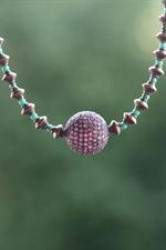 voir cet article : Catherine Michiels Collier en perles bronze et turquoise