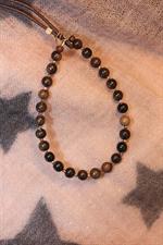 voir cet article : Catherine Michiels Bracelet ebony et or jaune