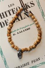 voir cet article : Catherine Michiels Bracelet mixte  en os, mudra en argent