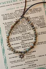 voir cet article : Catherine Michiels Bracelet opale et étoile de David en diamant