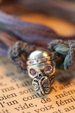 voir cet article : Catherine Michiels Charm's skull with butterfly argent