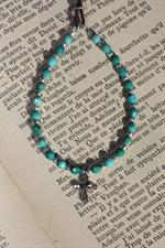 voir cet article : Catherine Michiels Bracelet Mini cross turquoise