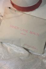 voir cet article : Where Else Pochette croisière Sandy Lane Beach Barbados