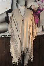 voir cet article : Swildens Poncho en soie