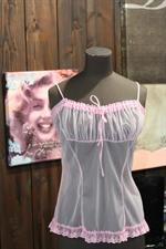 voir cet article : Fifi Chachnil Promotion Top sans manches
