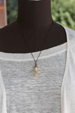 voir cet article : Scooter Bijoux Collier lien china blanc Tahiti